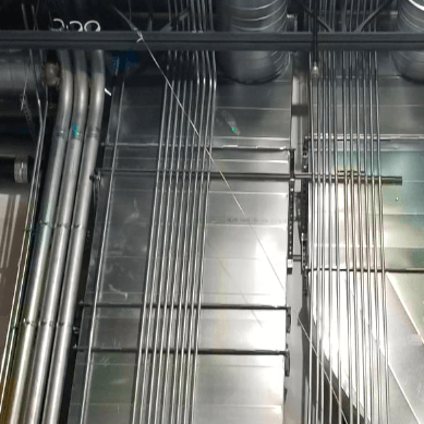 Wires in steel running along wall